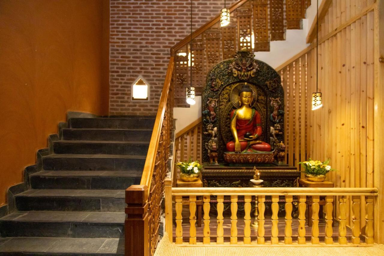 Basera Boutique Hotel 카트만두 외부 사진 The Buddha statue at the entrance of the hotel